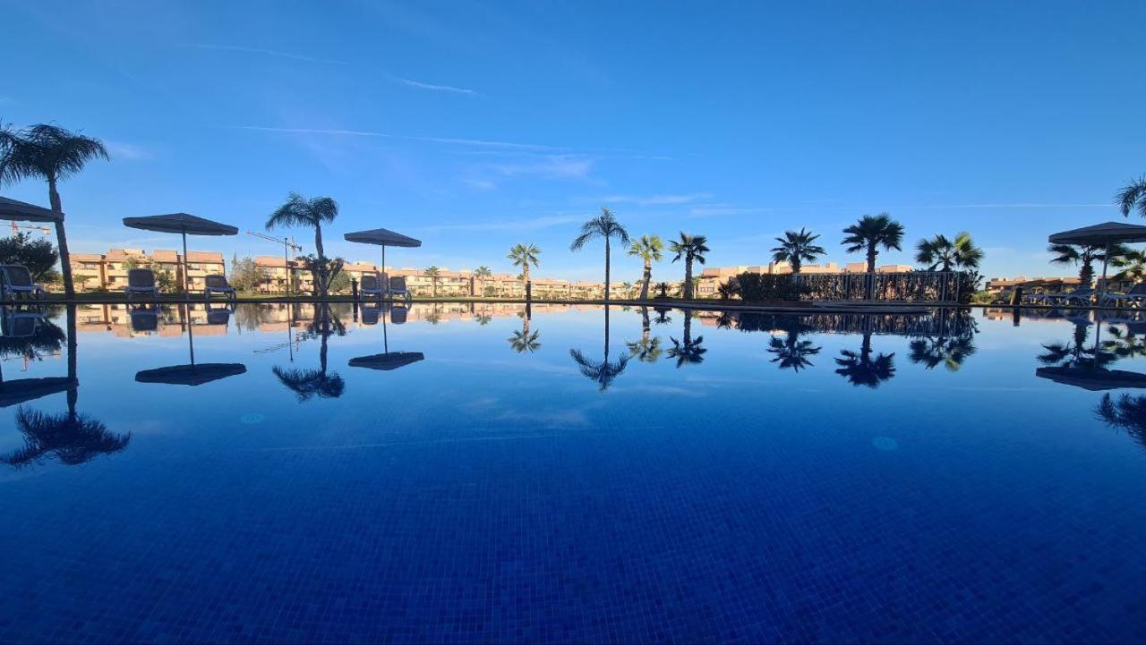Mini-Villa Situee Dans Une Residence Prestigia A Marrakech, Avec Une Vue Sur La Piscine Et Le Golf Une Securite 24H Sur 24 Et Une Proximite Ideale De L Aeroport 5 Minutes C Est Une Offre Parfaite Pour Des Vacances Marrakesh Buitenkant foto